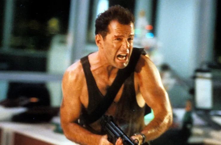 Photo from Die Hard (1988), directed by John McTiernan and starring Bruce Willis, Alan Rickman, and Alexander Godunov, produced by Twentieth Century Fox.