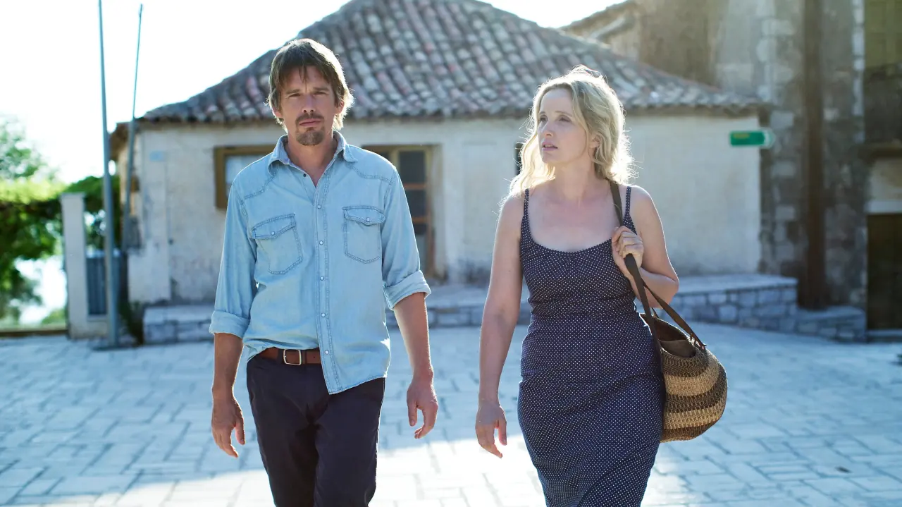 Scene from Before Midnight (2013) by Faliro House Productions, featuring Jesse and Celine in a candid moment reflecting on their relationship at a picturesque location. Source: Filmdb.co.uk