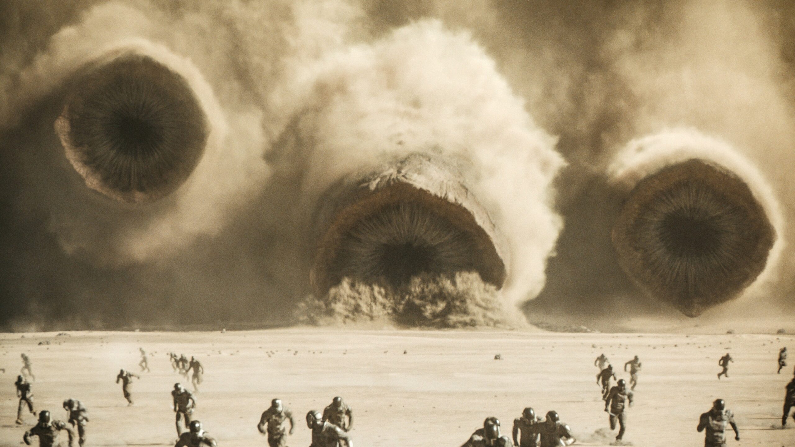 An epic promotional image from the upcoming 2024 sci-fi film "Dune: Part Two," produced by Warner Bros., depicting Paul Atreides and his allies in a dramatic desert setting, surrounded by rich details of the Arrakis landscape, showcasing the film's themes of power, conflict, and the continuation of the saga inspired by Frank Herbert's novel.