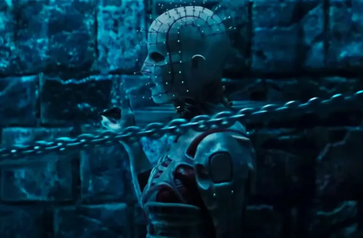 Hellraiser (2022) by 20th Century Studios, featuring the iconic Puzzle Box and a mysterious figure in a dark, eerie setting. Source: Filmdb.co.uk