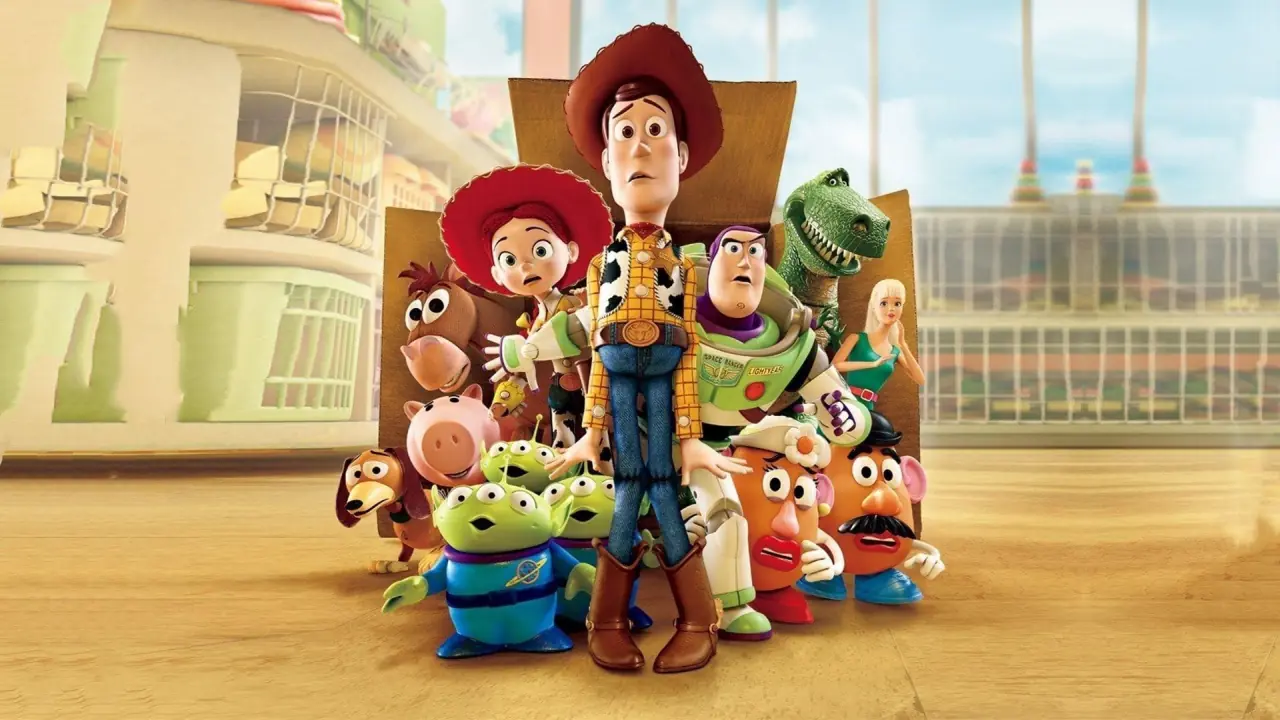 Scene from Toy Story 3 (2010) by Walt Disney Pictures, featuring Woody and Buzz Lightyear with their toy friends in a heartwarming setting. Source: Filmdb.co.uk