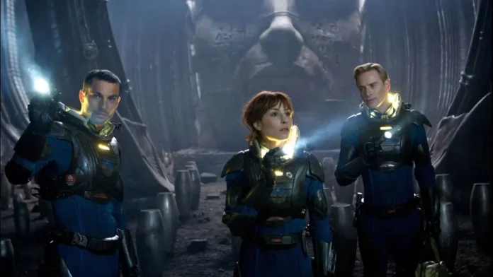 Still image from Prometheus (2012) showing the alien spaceship and characters exploring a mysterious alien landscape