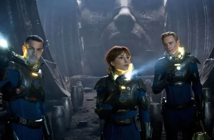 Still image from Prometheus (2012) showing the alien spaceship and characters exploring a mysterious alien landscape